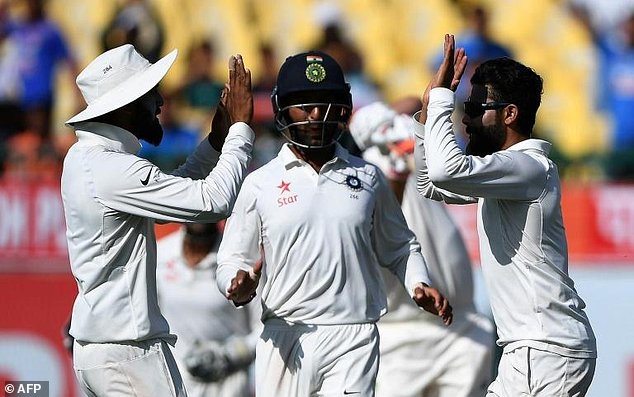 India's Ravindra Jadeja (right) celebrates the wicket of Australia's Pat Cummins on the third day of the fourth Test in Dharamsala on March 27, 2017